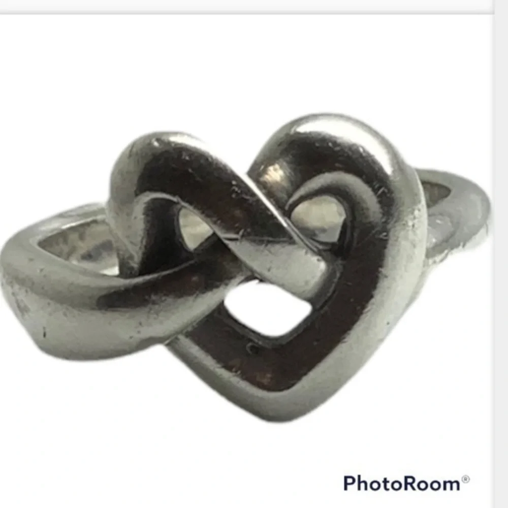 - James Avery sterling silver heart shaped ring